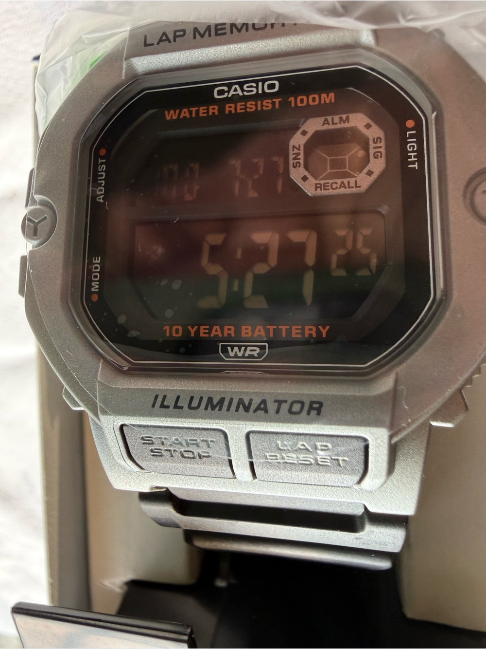 Casio Silver Digital Illuminator Watch with Orange Accents